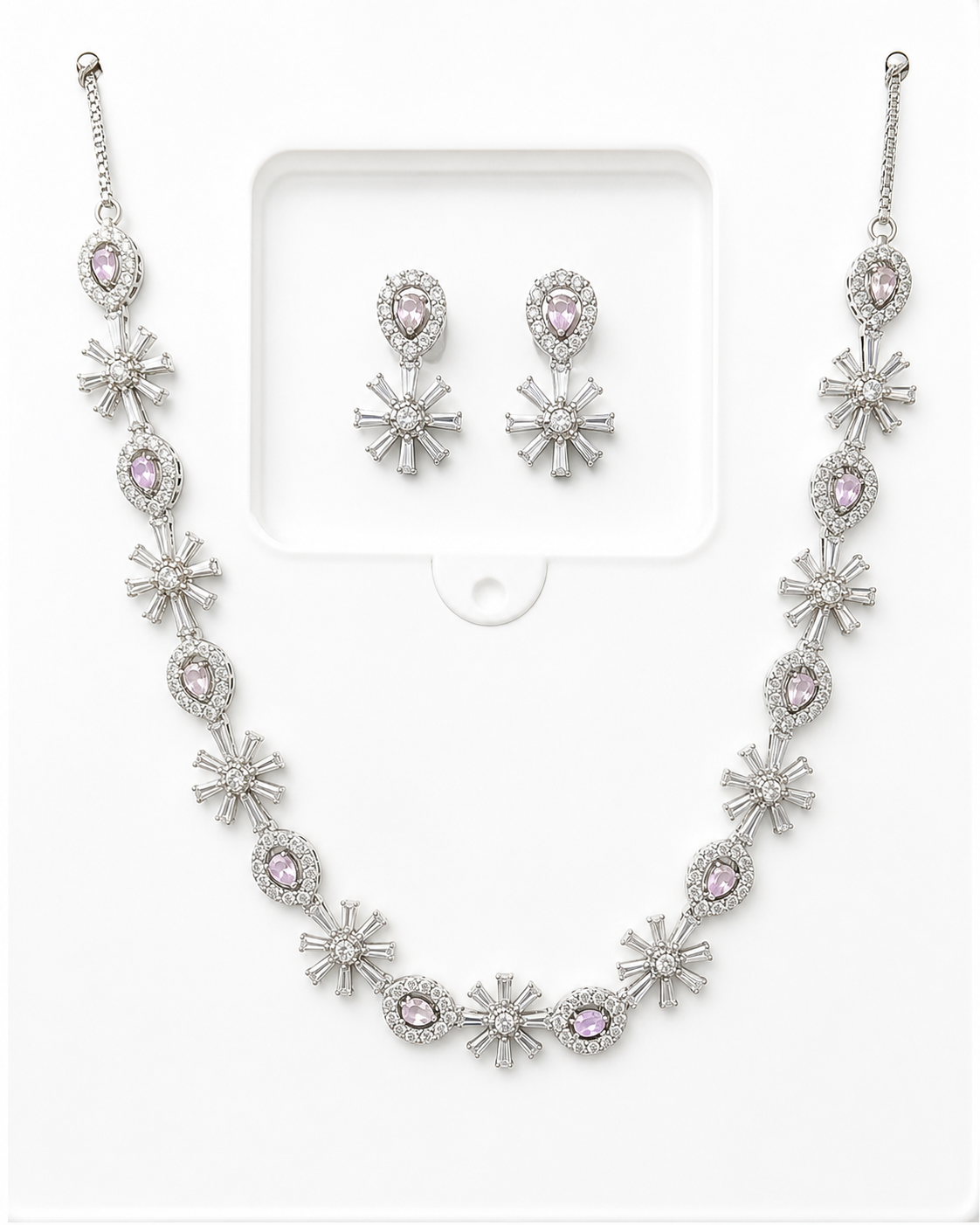 A stunning necklace and earring set adorned with lavender stones, sparkling crystals, and a radiant silver finish — crafted to make every moment special.