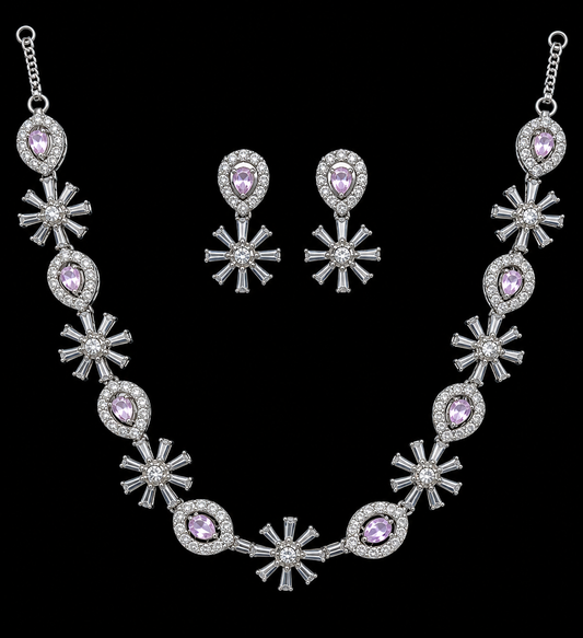 A stunning necklace and earring set adorned with lavender stones, sparkling crystals, and a radiant silver finish — crafted to make every moment special.