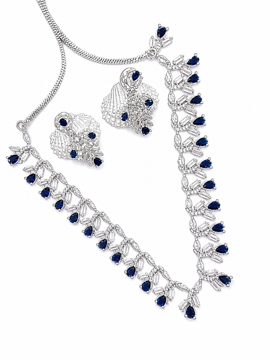 Brilliant blue stones paired with clear baguette cubic zirconia for exceptional sparkle.